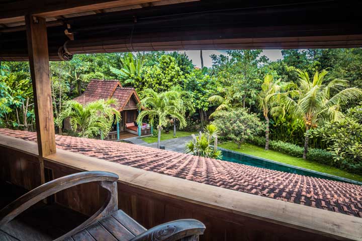 View of seterate bungalow room, Garden and the swimming pool from the mezzanine room